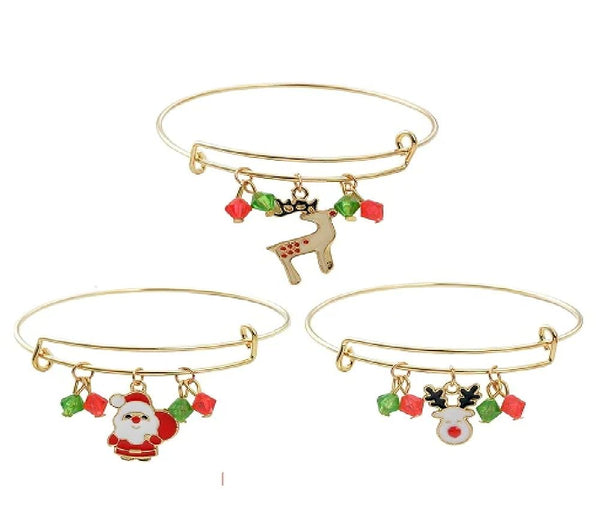 Charming Charlie Set of 3 Gold-Plated Christmas-Themed Charm Wired Bracelets - Women's Festive Charm Bracelets for the Holiday Season.