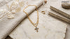 Abide Layered Cross Necklace Set.
